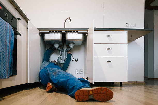 Professional Emergency Plumber technician working in Kipton, OH